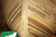 661: Bernard Mulrooney's new 38' long boat under construction in the boathouse by the lift bridge  in Placentia. (2004)